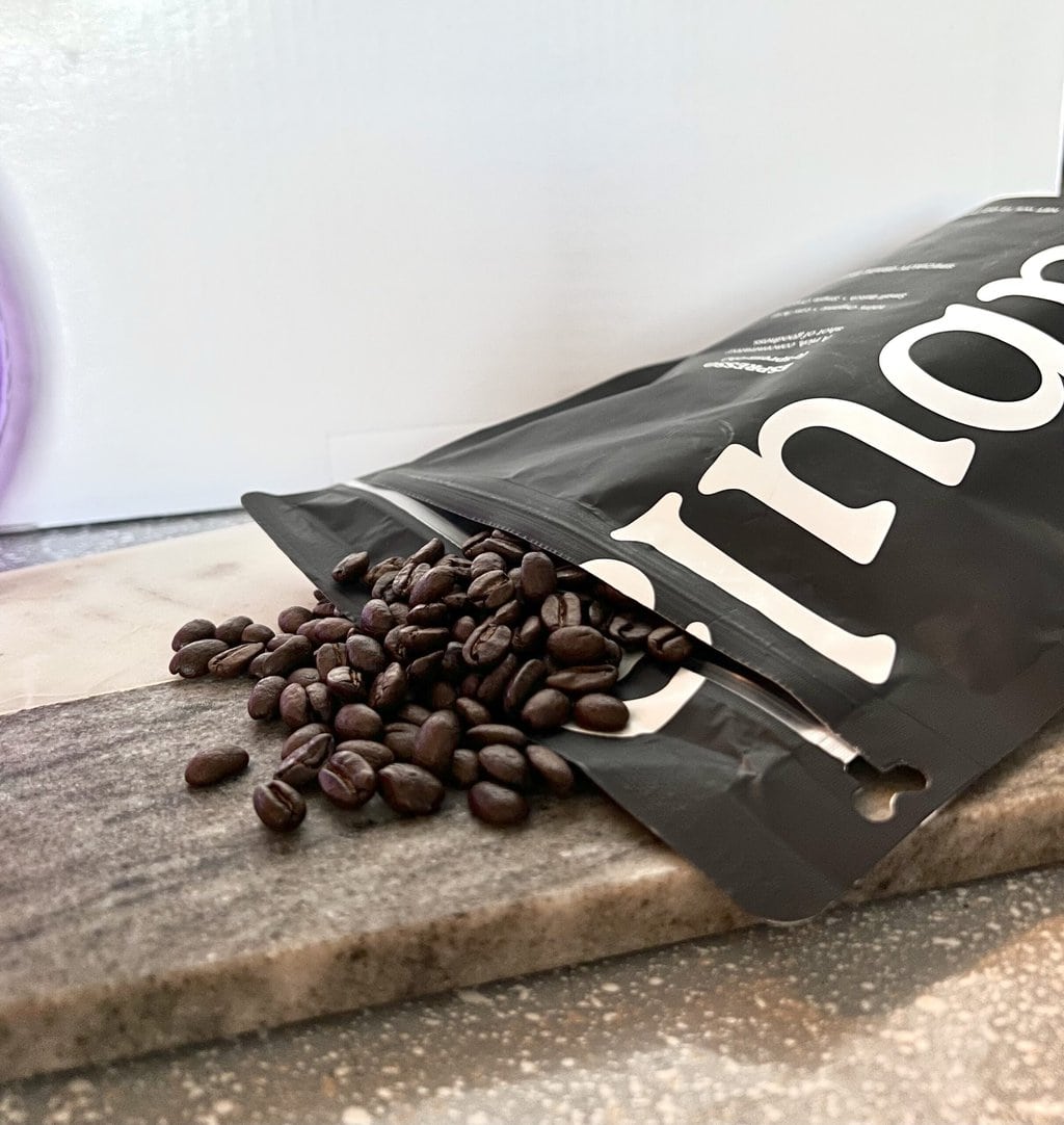 Fabula Espresso Organic Coffee - scattered coffee beans