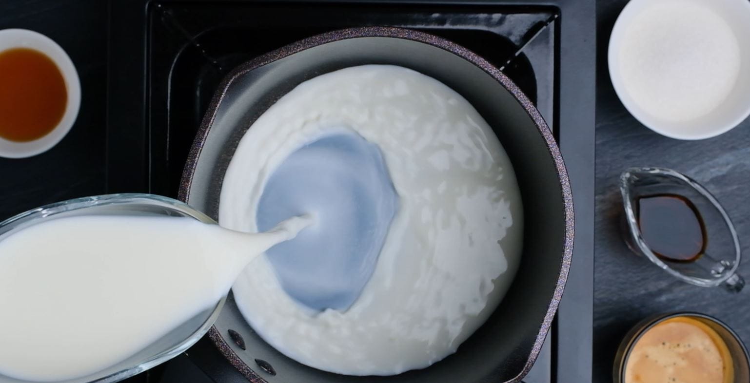 pouring Steamed Milk into saucepan