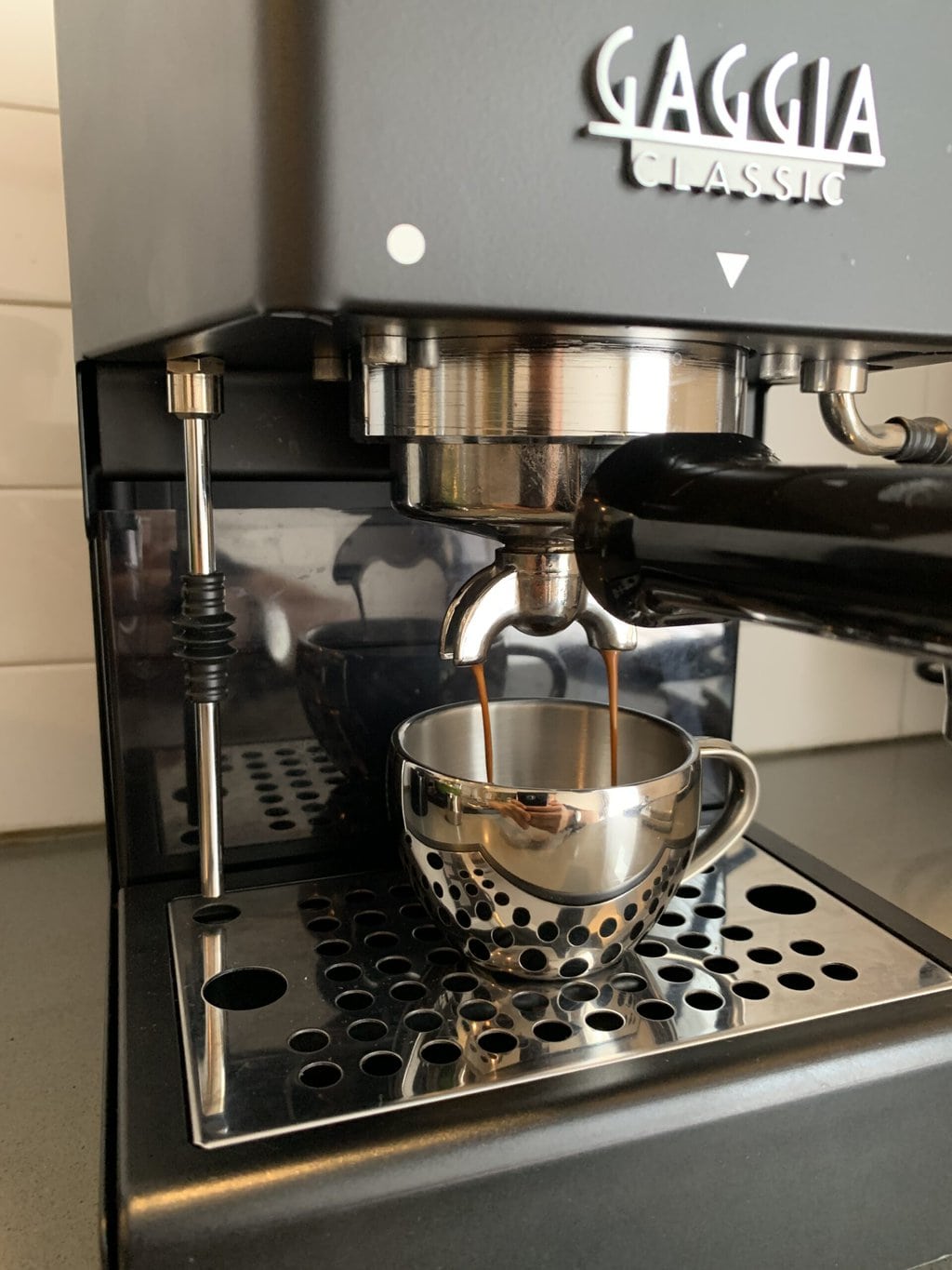 the process of brewing coffee in the Gaggia Classic espresso machine