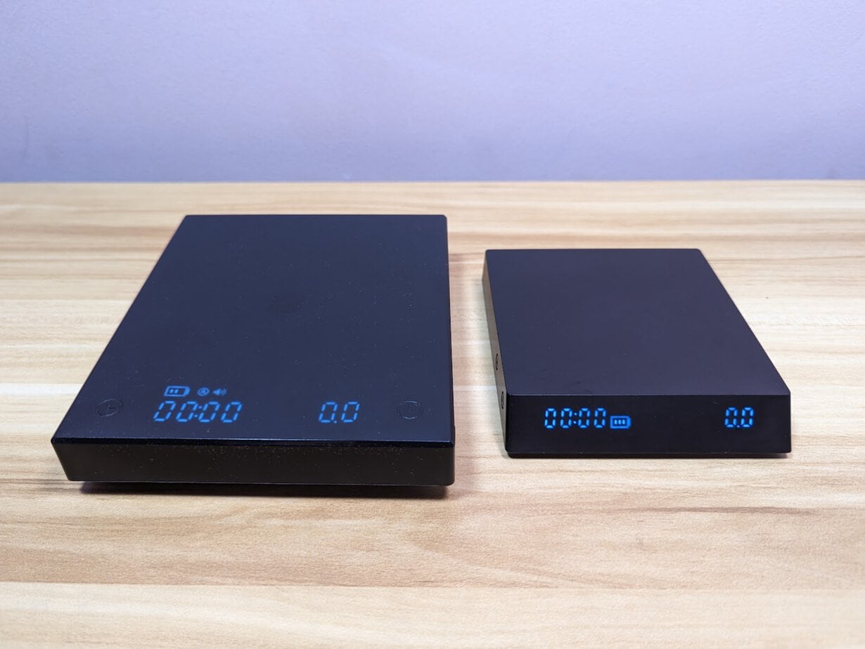 Timemore Black Mirror Nano and Timemore’s first scale on the wooden table